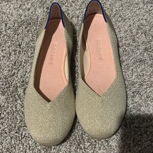 Metallic gold Rothy’s Flats